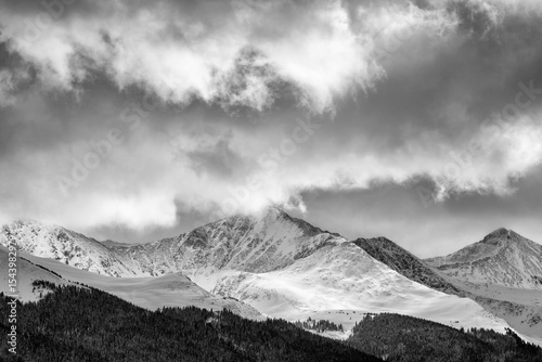 USA, Colorado, Summit County, Frisco. Sunlight breaks through clouds along th...