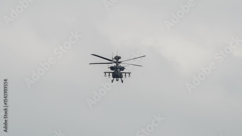 British army Boeing Apache Attack Longbow helicopter gunship AH2 AH64E AH-64E AAC flying away 