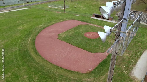 Baseball field establishing from behind lights aerial 4k
