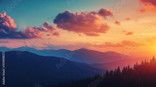 Vibrant mountain sunset with colorful sky and scattered clouds over a scenic landscape