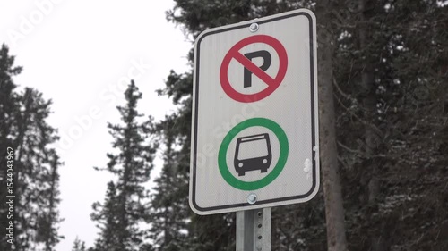 No parking bus stop sign in snow 4k
