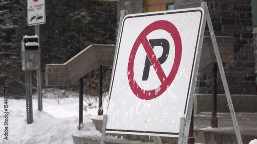 No parking sign at park in snow winter weather 4k
