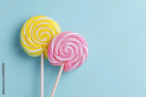 Lollipop candy on blue background