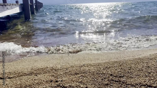 Shores of Lake Tahoe in Stateline, Nevada. Border of Nevada & South Lake Tahoe- waves crashing on a pebbly shore.