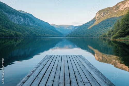 Symmetrical dock in calm alpine lake