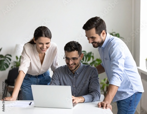Diverse business team collaborating in a modern office, mixed ethnicities, men and women of different ages, casual business attire, working together around 