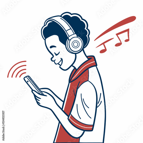 Happy boy listening to music on headphones using smartphone