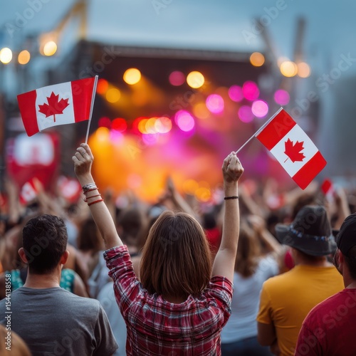 Crowd waving canadian flags at a concert for national celebration, patriotic events, and canada day promotions