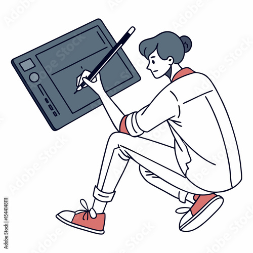 Young artist drawing on graphics tablet