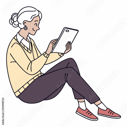 Senior woman sitting floor using tablet device