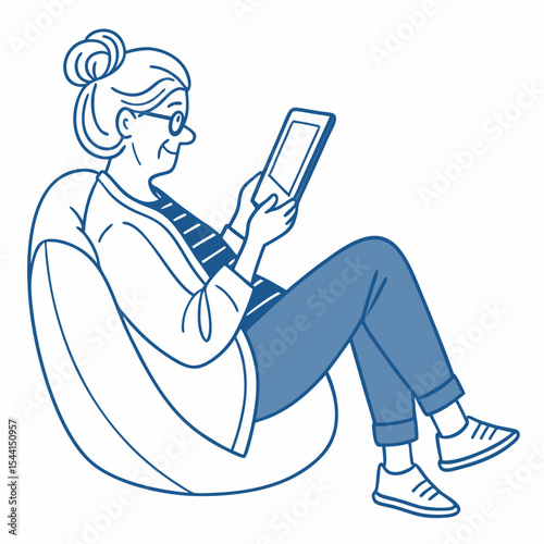 Senior woman relaxing using tablet in chair