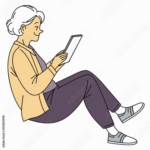 Senior woman using tablet relaxed sitting pose