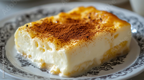 A rich, creamy Turkish Supangle dessert, beautifully layered with chocolate pudding, garnished with pistachios and served in an elegant glass, with a silky smooth texture and indulgent flavor