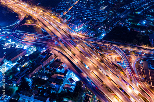 Fotografie Morden city and smart transportation with Expressway, Road and Roundabout, busy highway traffic night time