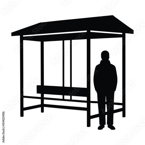 man waiting at bus stop