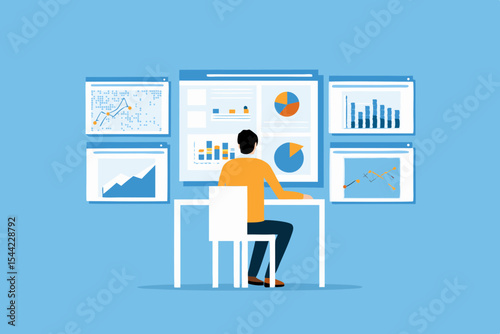 Man analyzing data charts and graphs on multiple screens at his desk