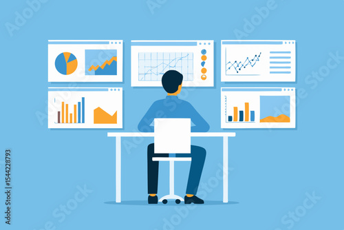 Man analyzing data charts and graphs on multiple screens at his desk