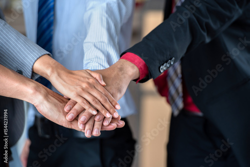 Wallpaper Mural business teamwork putting join hands together. Unity and teamwork show by Stack mix of hands with Spirit diversity solidarity team Partner. Joins hands together teamwork meetings empower. Torontodigital.ca