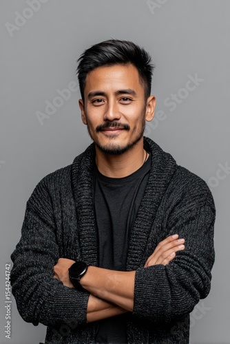 Portrait of a man with arms crossed
