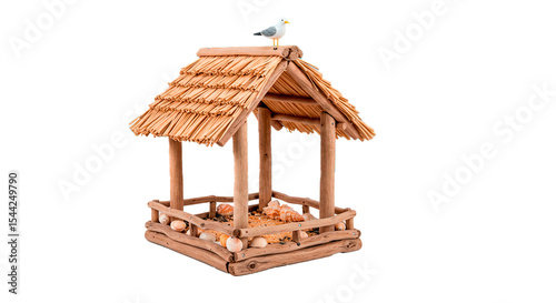 Rustic wooden bird feeder with thatched roof and seagull decoration for outdoor garden decor feeding birds on transparent background
