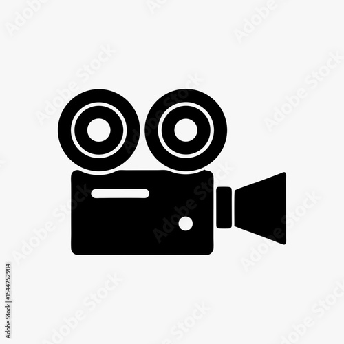 Black silhouette of vintage movie camera icon with dual reels on white background
