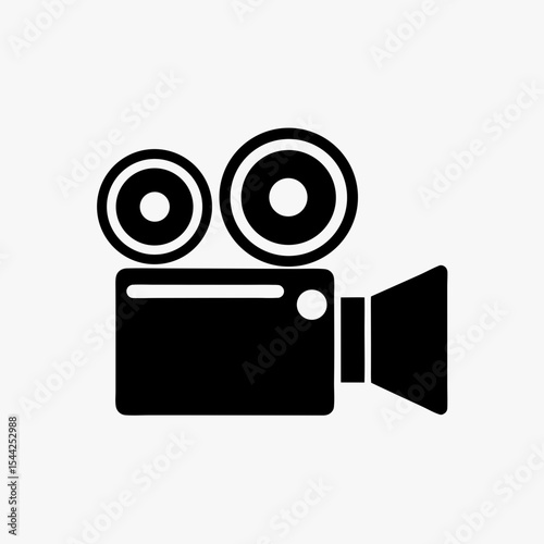 Black silhouette of vintage movie camera icon with dual reels on white background
