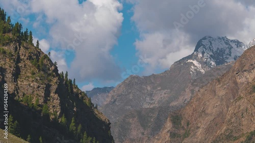 4K Summer mountains and clouds time lapse at Miyar Valley, Himachal Pradesh, India. Clouds sky, sunny environment, travel view.