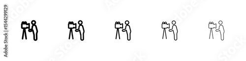 Cameraman icon black and white vector sign