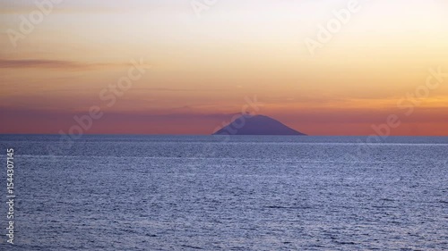 Wallpaper Mural Stromboli Volcano silhouette at sunset with colorful sky in the background, view from Capo Vaticano, Calabria, Italy Torontodigital.ca