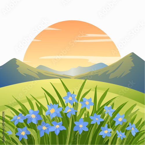 Green grass with wild blue flowers in the mountains at sunset. Beautiful summer landscape