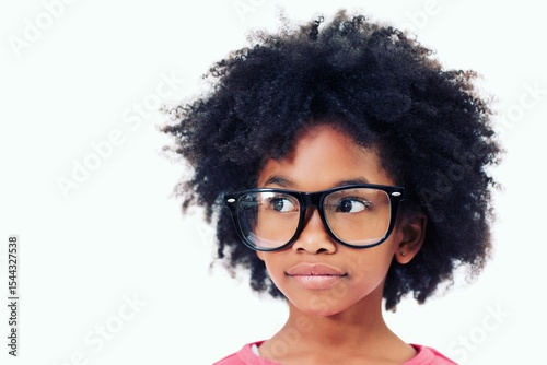 Close up of girl with frizzy hair wearing big glasses