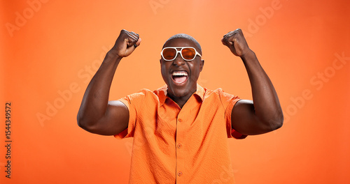 Konstfotografi Winner, black man and fist pump for celebration in studio with sunglasses for fashion prize