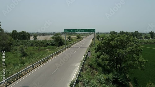 Highway shot with sign board in Punjab India.