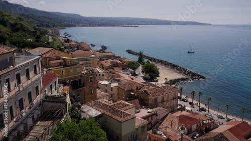 Picturesque cityscape of Pizzo Calabro with traditional red tiled roofs, overlooking the Tyrrhenian Sea in Calabria, Southern Italy