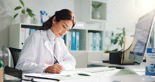 Tableau sur toile Computer, woman and doctor writing report in clinic for research, diagnosis or treatment
