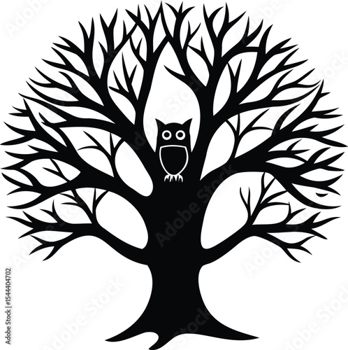 Silhouette of a tree with bare branches and an owl at its center
