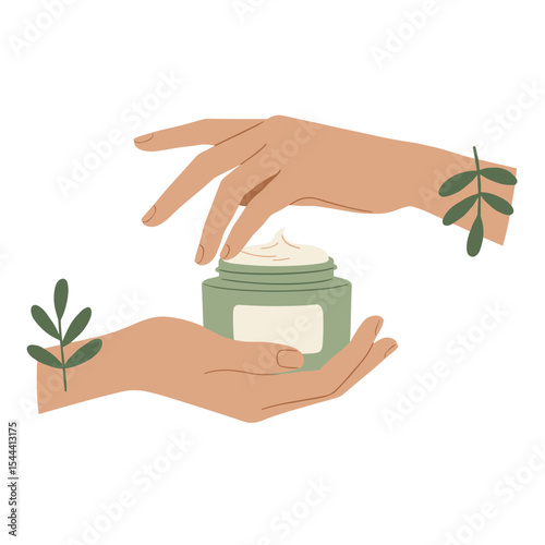 Hands applying natural cream from green cosmetic jar