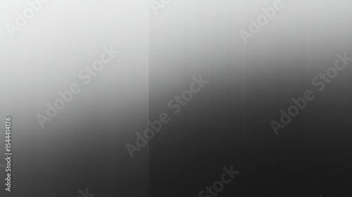 A grayscale gradient background with a subtle vertical division and smooth color transition effect