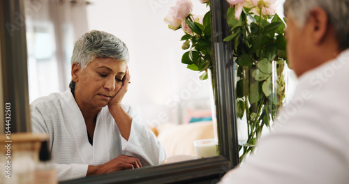Photography Sad, senior woman and thinking in bedroom for grief, mourning loss and insecure of skincare