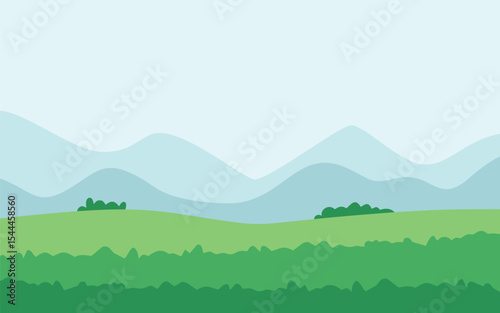 Green field landscape with mountains