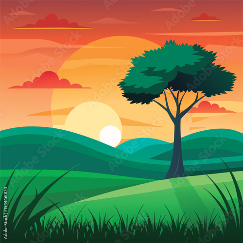 Sunrise landscape with lone tree.