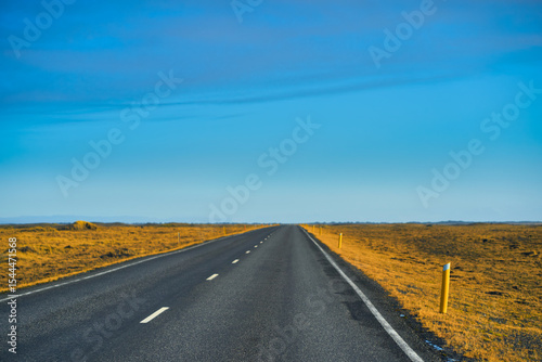 Empty Road way for roadtrip in iceland travel , adventure travel in autumn field and cloudy view.
