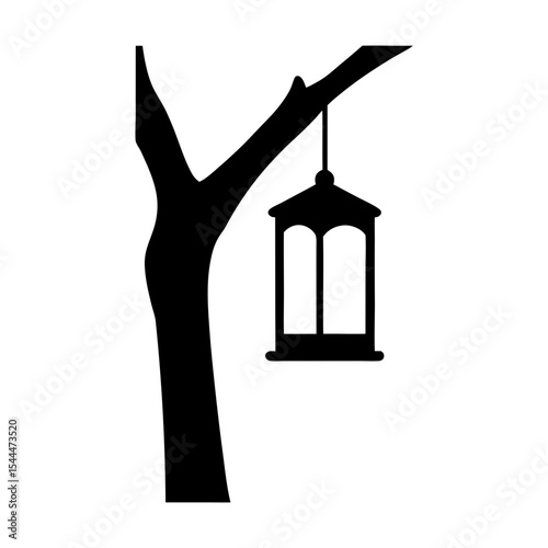 Silhouette of a bird feeder hanging from a branch in a tree