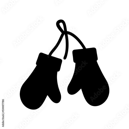 Isolated black and white mittens connected by a string for winter wear