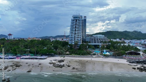 Blue ocean and beach along tropical city coast