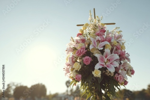 A sunlit bouquet of lilies and roses whispers softly of Dia de los Muertos and renewal's tender embrace