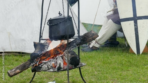 Medieval cooker in the medieval encampment