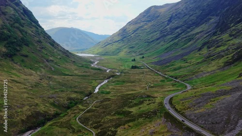 Breathtaking panoramic drone footage of Loch Achtriochtan in Glen Coe, Scotland, capturing dramatic mountains, reflections, and natural beauty of the Highlands photo