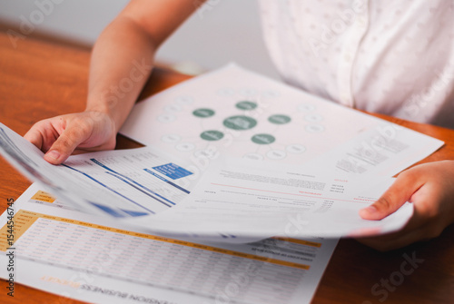 Analyzing financial reports the office business environment document review detailed perspective