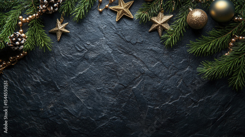 Golden ornaments, green fir branches, and pine cones beautifully frame the dark slate background here